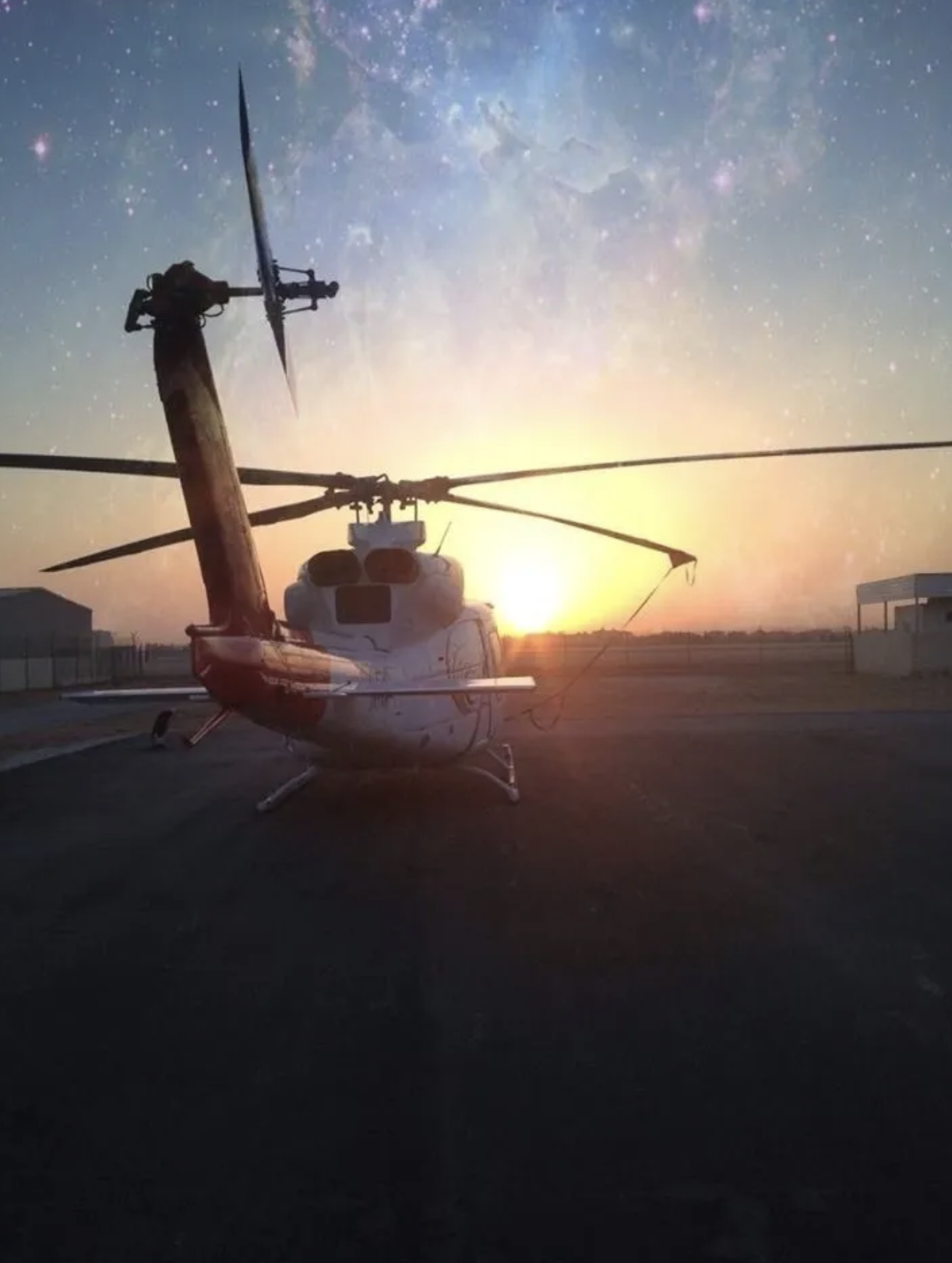Bell 412 helicopter at sunset in Saudi Arabia